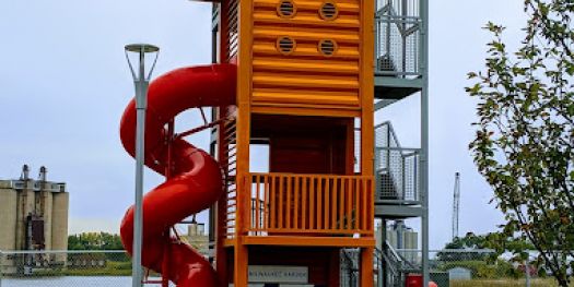 Play structure made from shipping containers